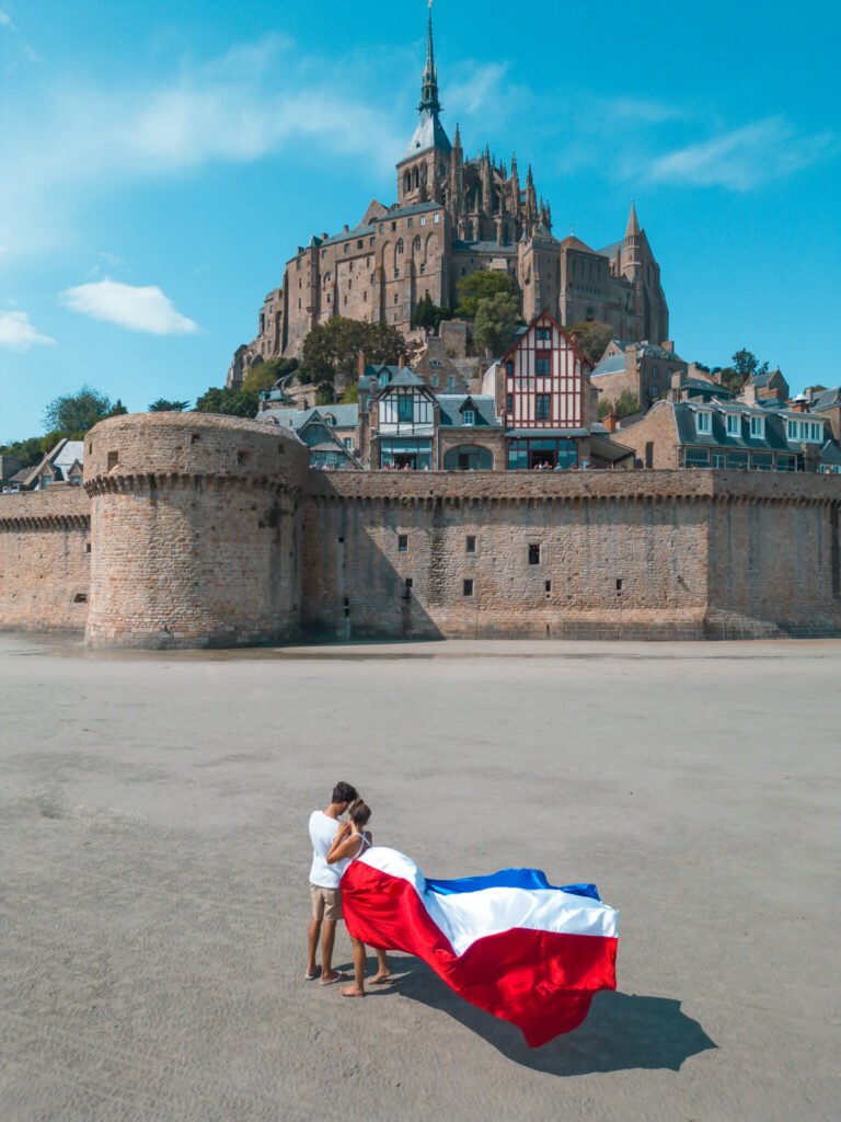 Flying dress photoshoot at Mont Saint Michel in France with Flying Dresses New York