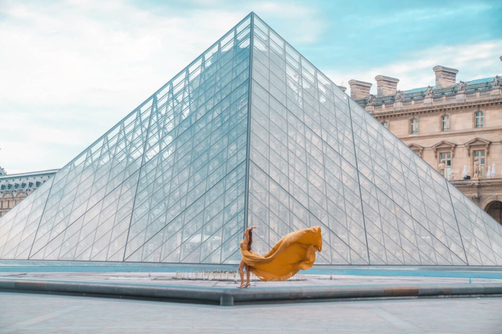 Flying dress photoshoot at the Louvre in Paris, France