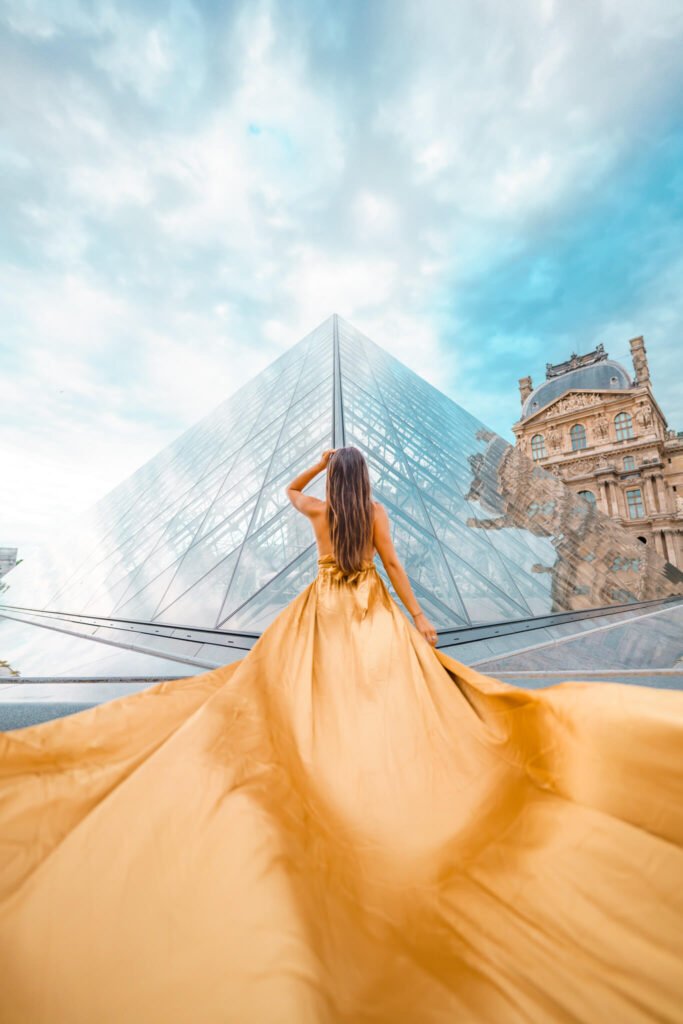 Flying dress photoshoot at the Louvre in Paris, France