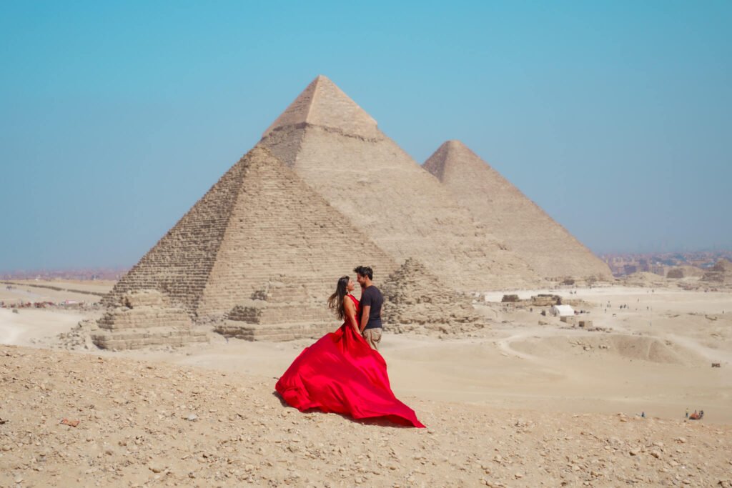 Flying dress photoshoot iat the pyramids of Giza in Egypt