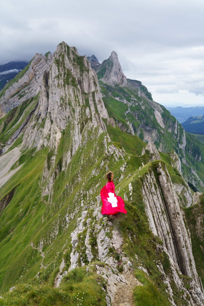 Flying dress photoshoot on a mountain in Switzerland