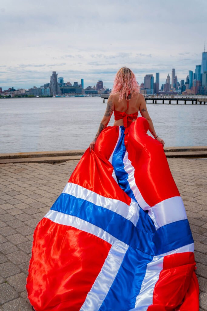 girl in a Norway flag flying dress by Flying Dresses New York