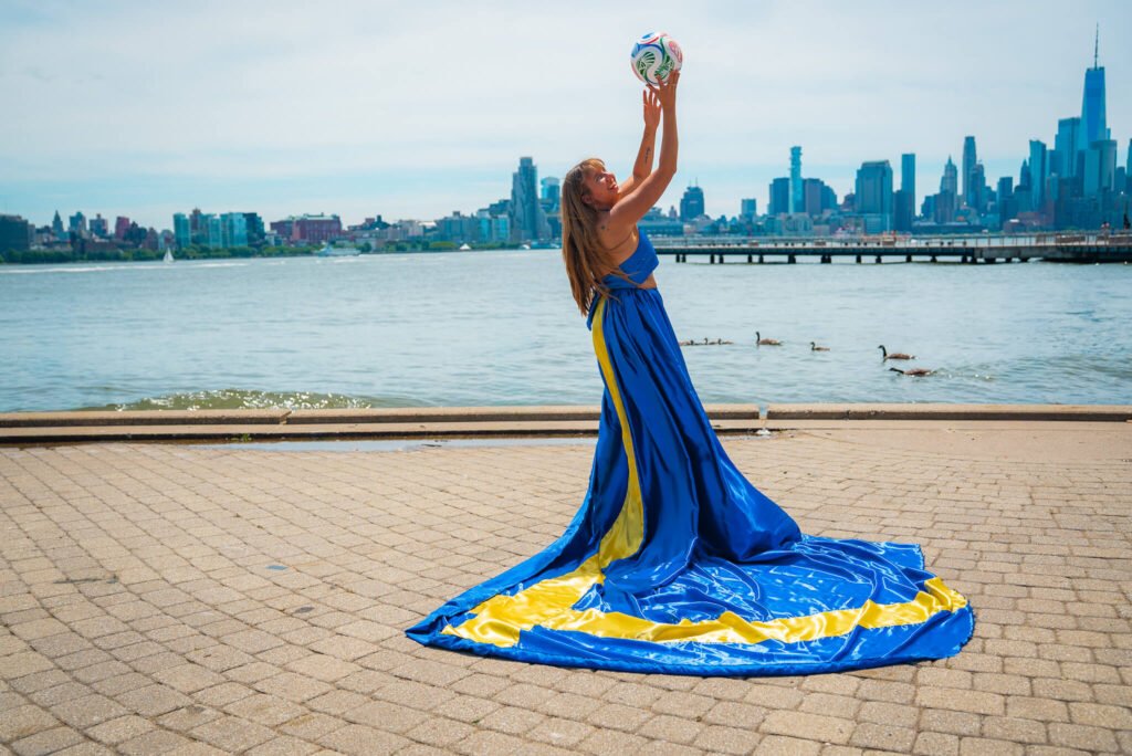 girl in a Sweden flag flying dress by Flying Dresses New York