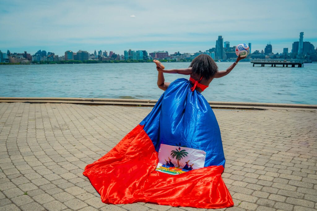 girl in a Haiti flag flying dress by Flying Dresses New York