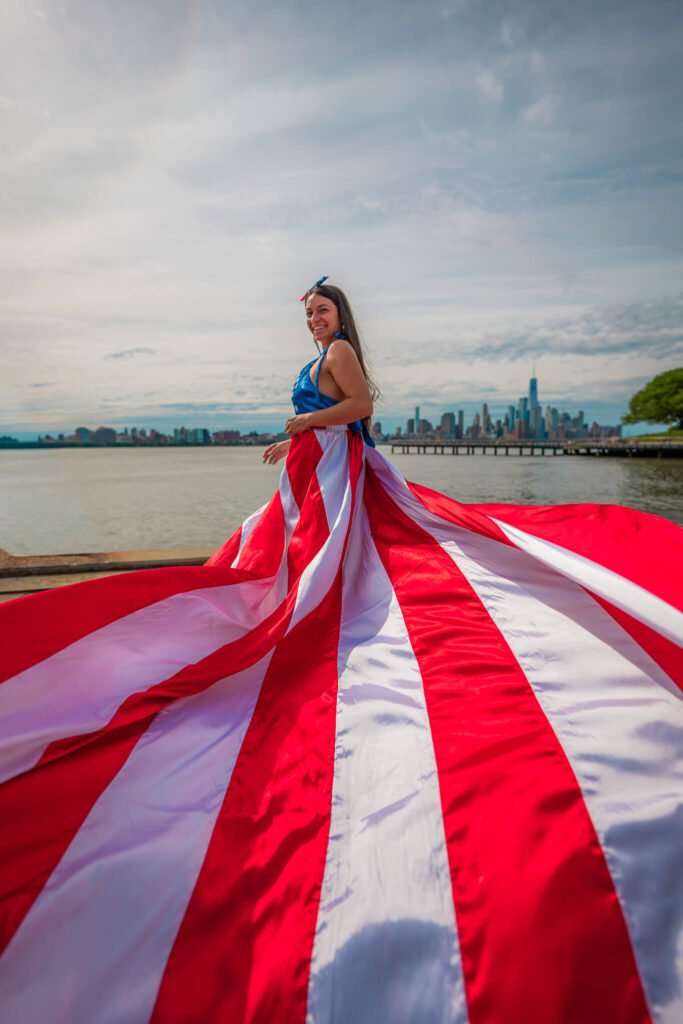 girl in a USA flag flying dress by Flying Dresses New York