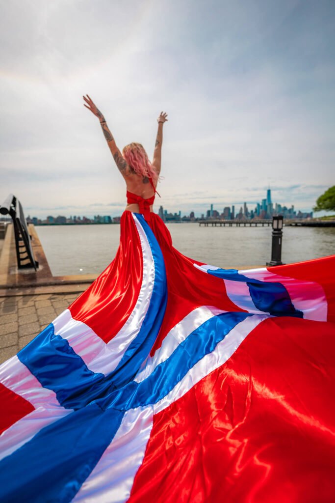girl in a Norway flag flying dress by Flying Dresses New York