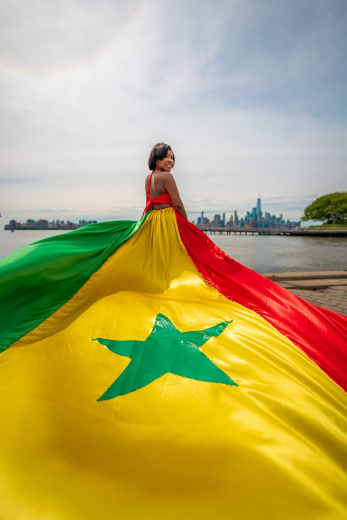 girl in a Senegal flag flying dress by Flying Dresses New York
