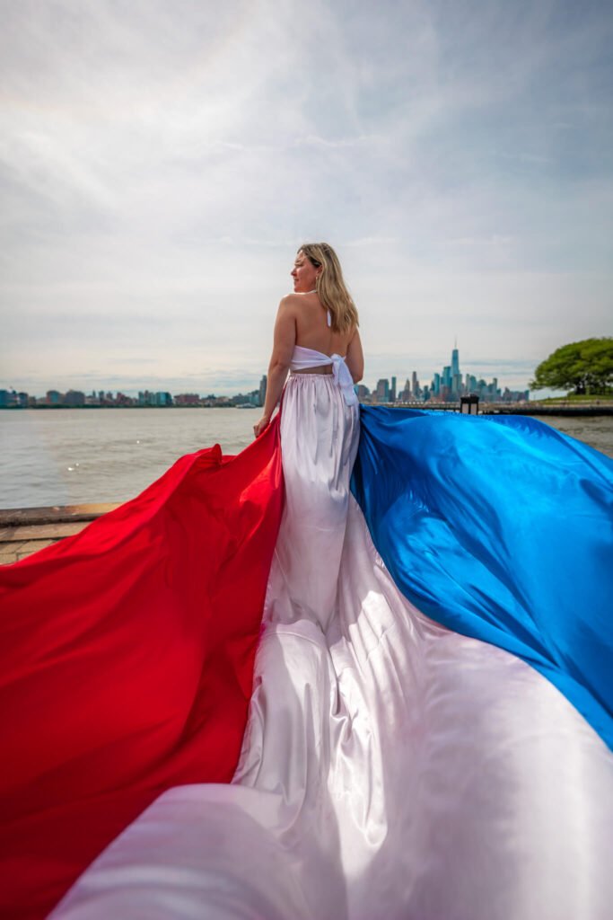 girl in a France flag flying dress by Flying Dresses New York