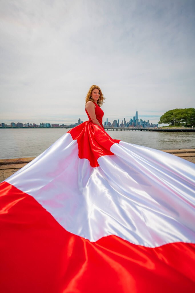 girl in an Austria flag flying dress by Flying Dresses New York