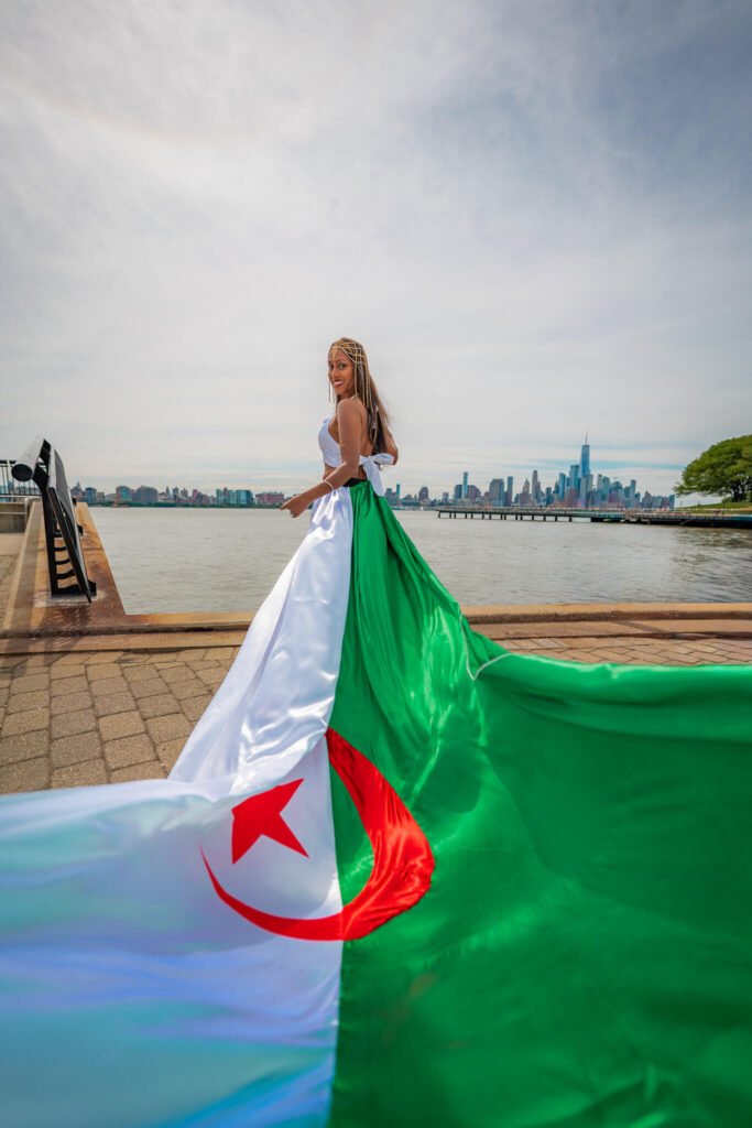 girl in an Algeria flag flying dress by Flying Dresses New York