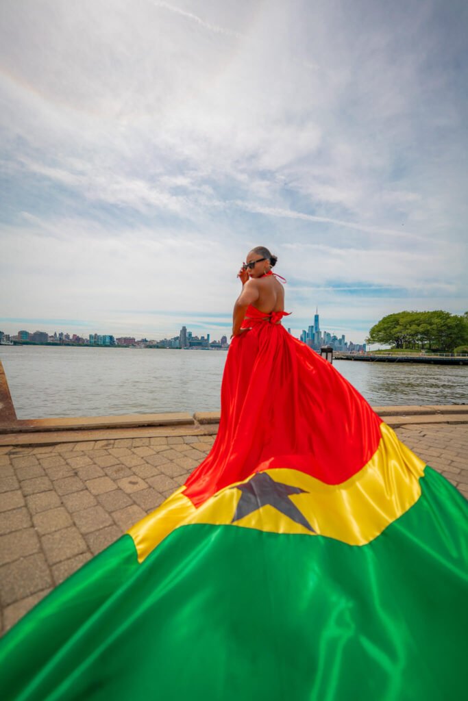 girl in a Ghana flag flying dress by Flying Dresses New York