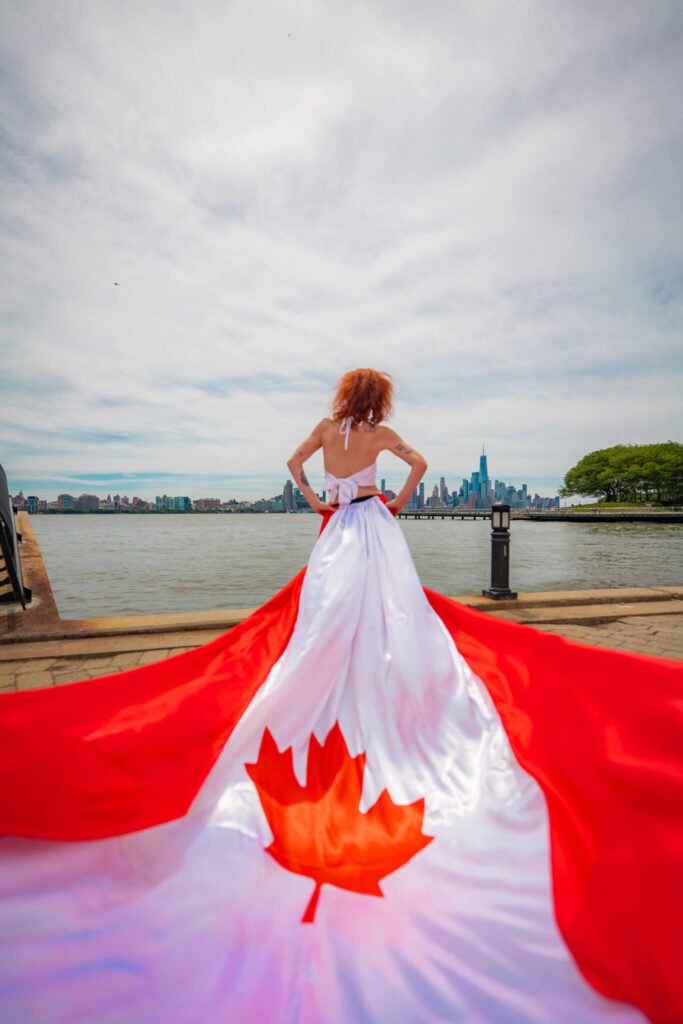 girl in a Canada flag flying dress by Flying Dresses New York