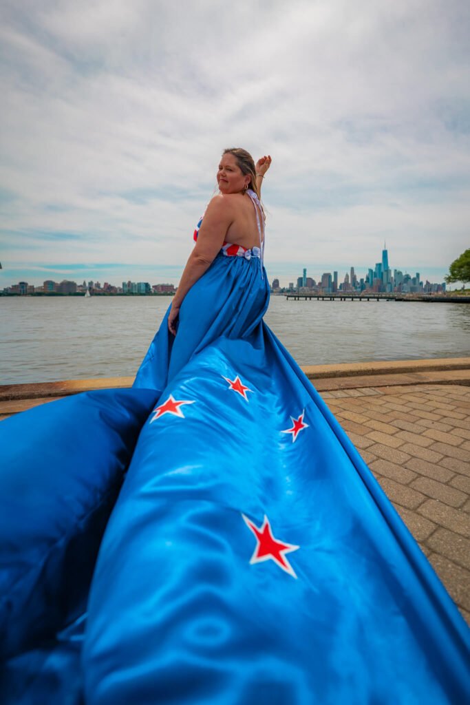girl in a New Zealand flag flying dress by Flying Dresses New York