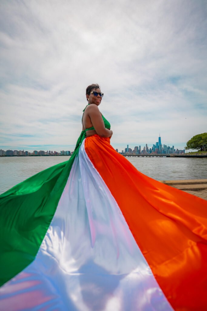 girl in an Ivory Coast flag flying dress by Flying Dresses New York
