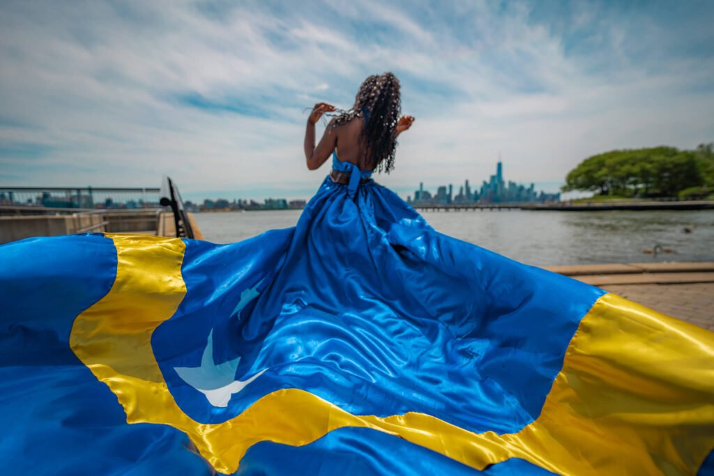 girl in a Curacao flag flying dress by Flying Dresses New York
