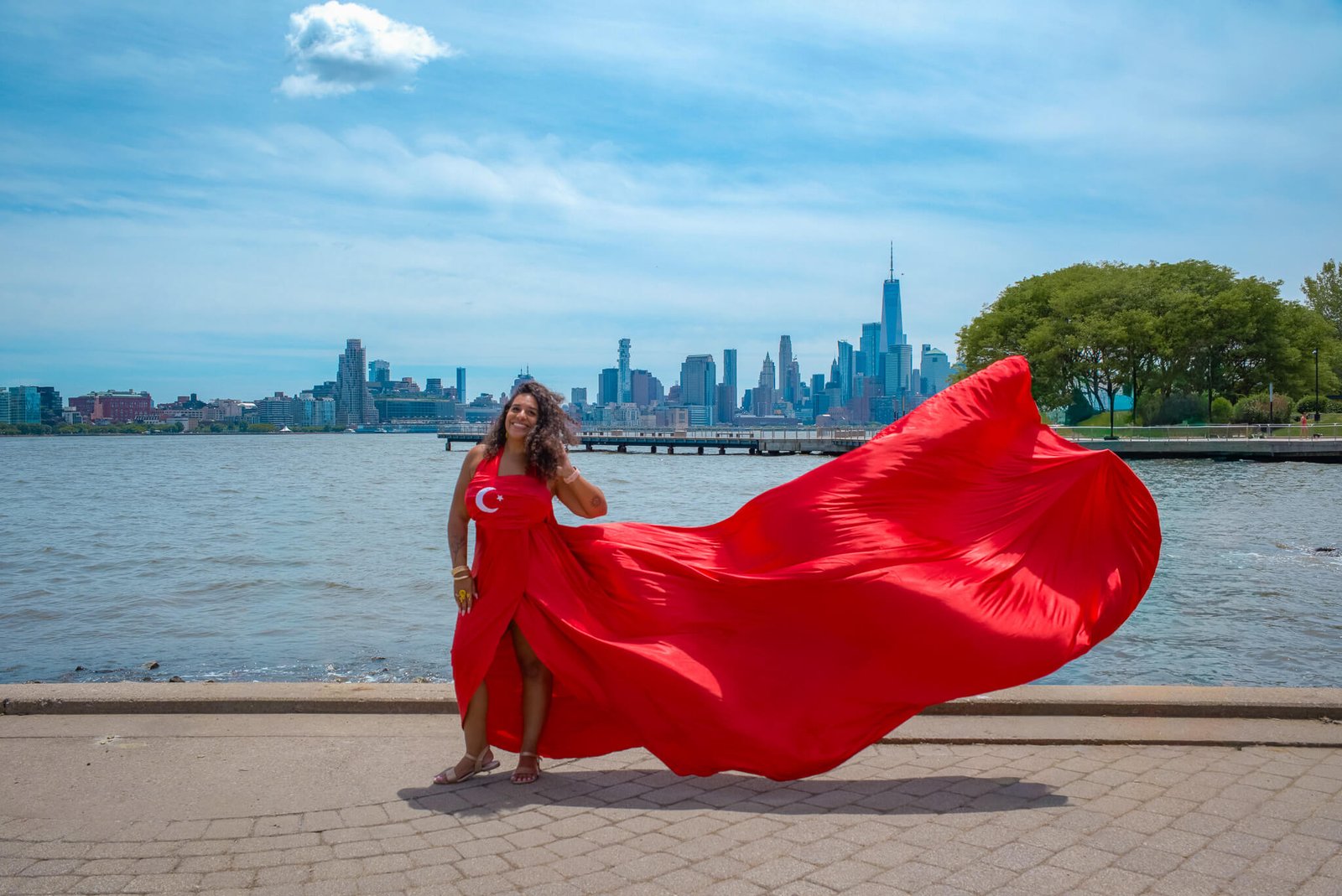 Morocco dress photoshoot in front of the NYC skyline with Flying Dresses New York