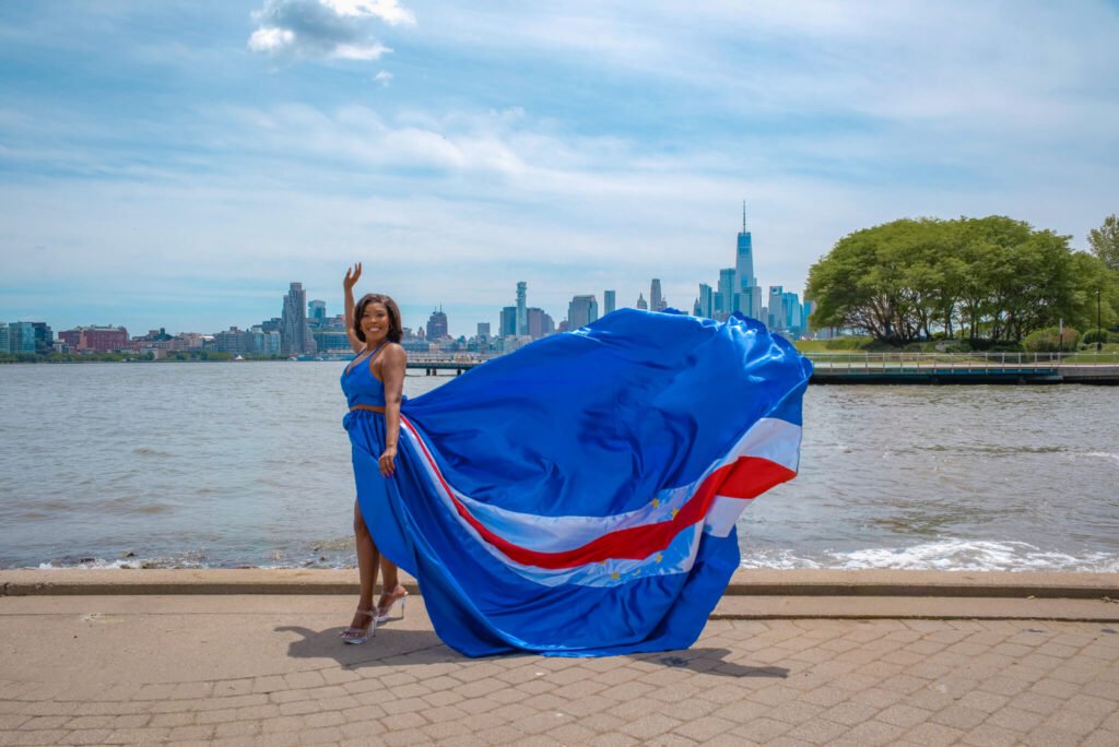 girl in a Cabo Verde flag flying dress by Flying Dresses New York