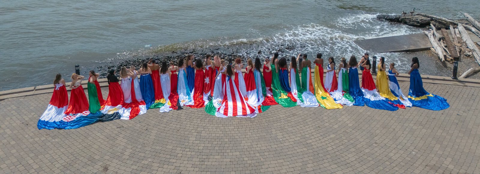 World Cup event with women in flag flying dresses