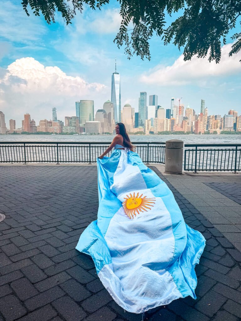 Girl in an Argentinian flag flying dress at Exchange Place in New Jersey