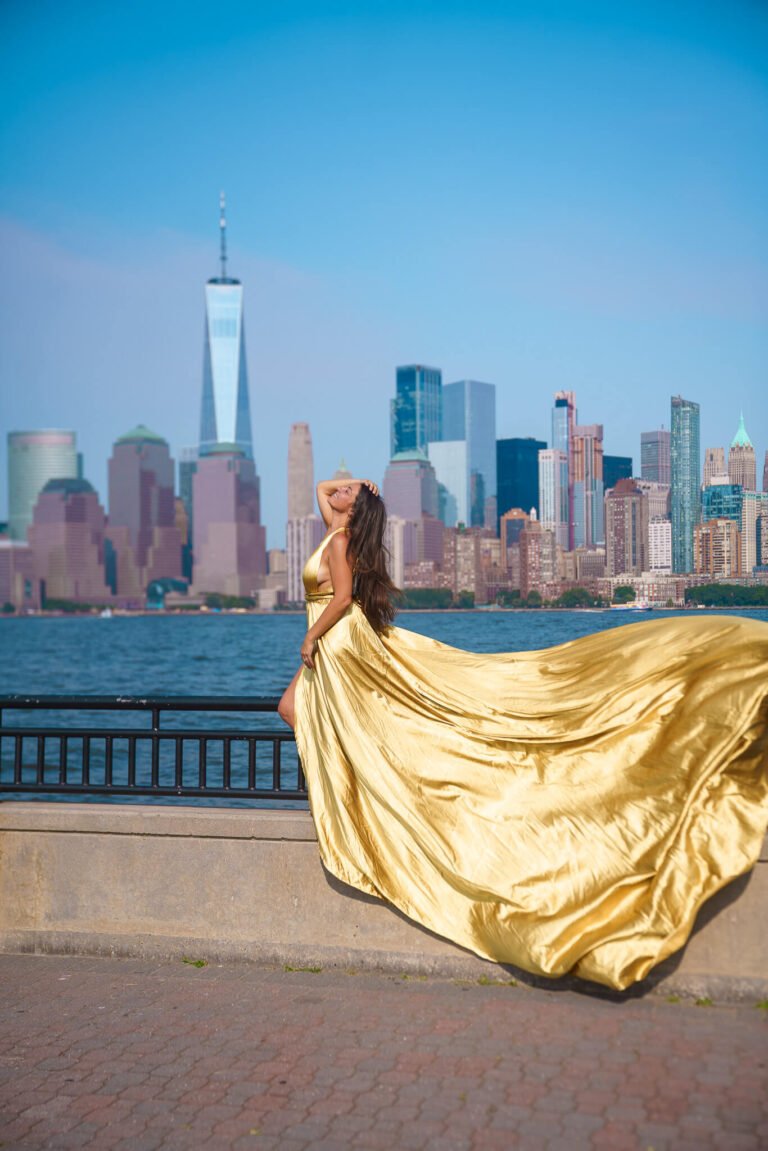 girl in a hot pink flying dress in Liberty State Park, New Jersey